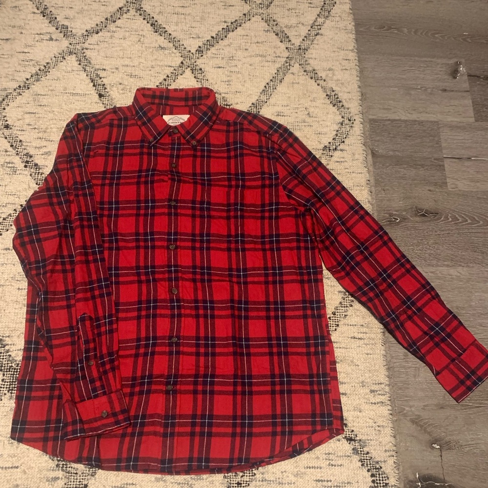 Men’s button up red and black flannel.